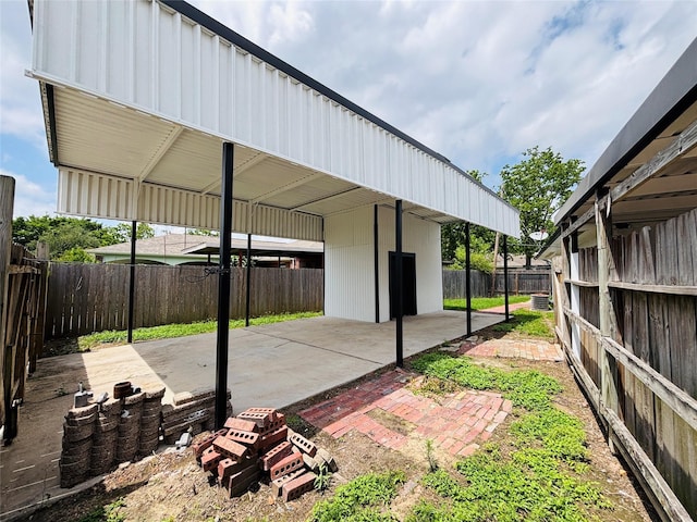 exterior space with a fenced backyard
