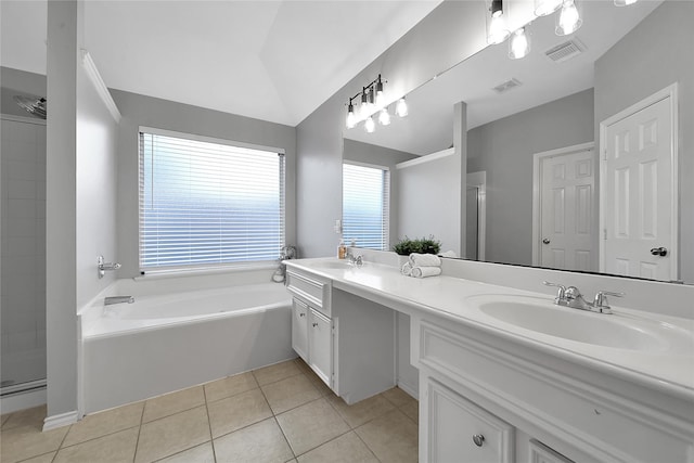 full bathroom featuring visible vents, a sink, tile patterned floors, and a stall shower