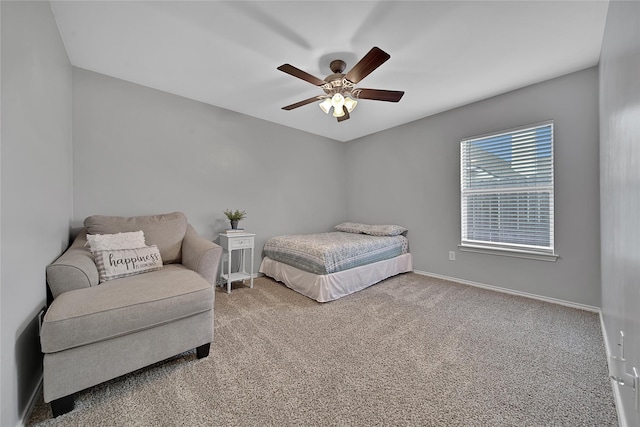 bedroom featuring baseboards, carpet flooring, and ceiling fan