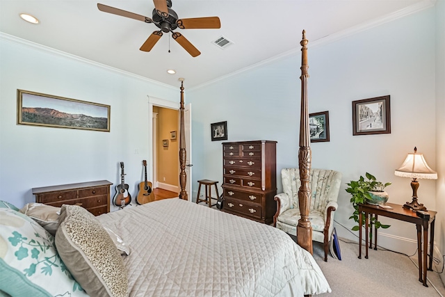 carpeted bedroom with recessed lighting, baseboards, visible vents, and ornamental molding
