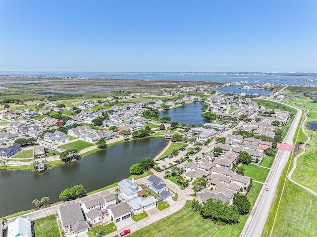 aerial view featuring a residential view and a water view