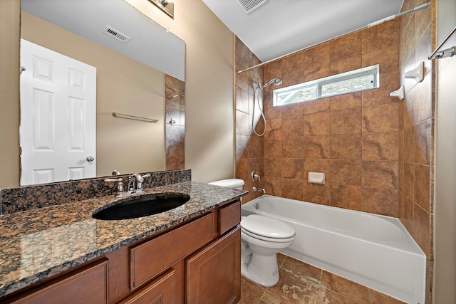 11014 Via Capri Ct, Richmond, TX 77406 - full bathroom featuring toilet, vanity, shower / tub combination, and tile patterned floors