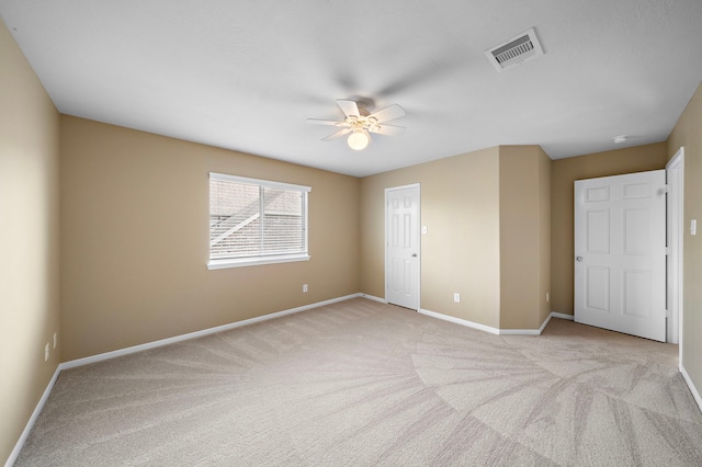 11014 Via Capri Ct, Richmond, TX 77406 - unfurnished bedroom with carpet floors, baseboards, and a ceiling fan