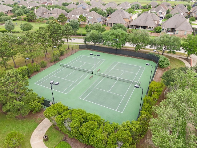 11014 Via Capri Ct, Richmond, TX 77406 - view of tennis court featuring a residential view
