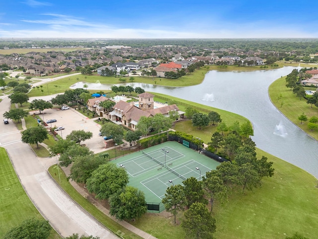 bird's eye view with a residential view and a water view
