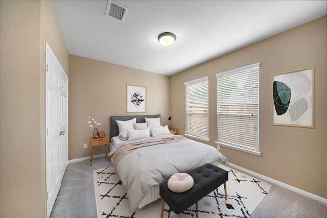 11014 Via Capri Ct, Richmond, TX 77406 - bedroom with light colored carpet and baseboards