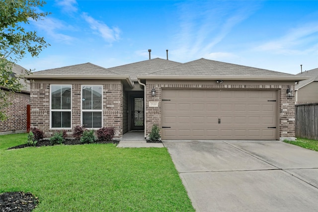 ranch-style home featuring concrete driveway, an attached garage, brick siding, and roof with shingles