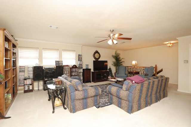 12219 Renaissance Ln, Houston, TX 77071 - carpeted living area with visible vents, ornamental molding, and a ceiling fan