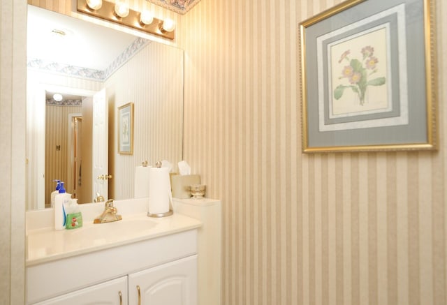 12219 Renaissance Ln, Houston, TX 77071 - bathroom featuring vanity and wallpapered walls