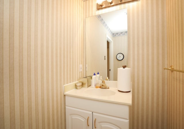 12219 Renaissance Ln, Houston, TX 77071 - bathroom featuring vanity and wallpapered walls