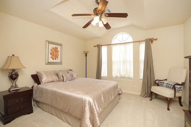 12219 Renaissance Ln, Houston, TX 77071 - bedroom featuring light colored carpet, baseboards, vaulted ceiling, and ceiling fan