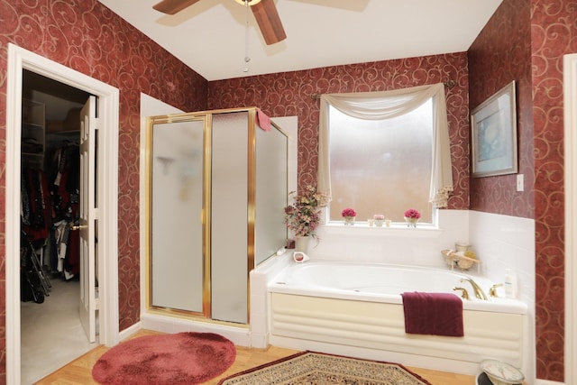12219 Renaissance Ln, Houston, TX 77071 - bathroom featuring wallpapered walls, a shower stall, a walk in closet, and a bath