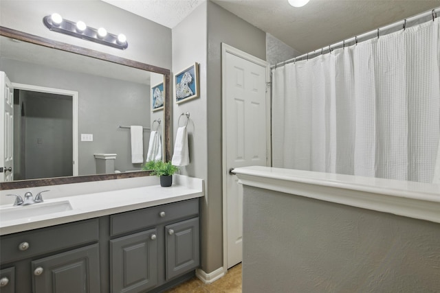 full bath featuring vanity and a shower with curtain