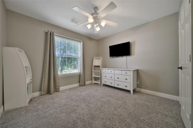 bedroom featuring light colored carpet, baseboards, ceiling fan, and visible vents