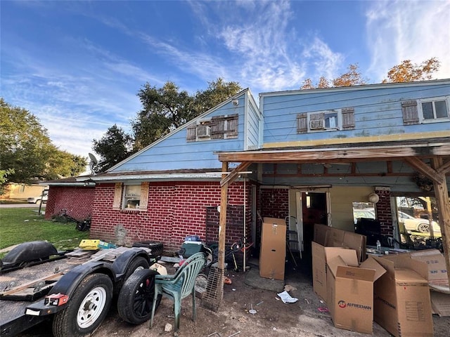 back of property with brick siding