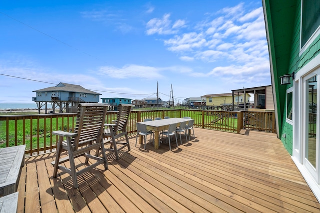 deck with outdoor dining space