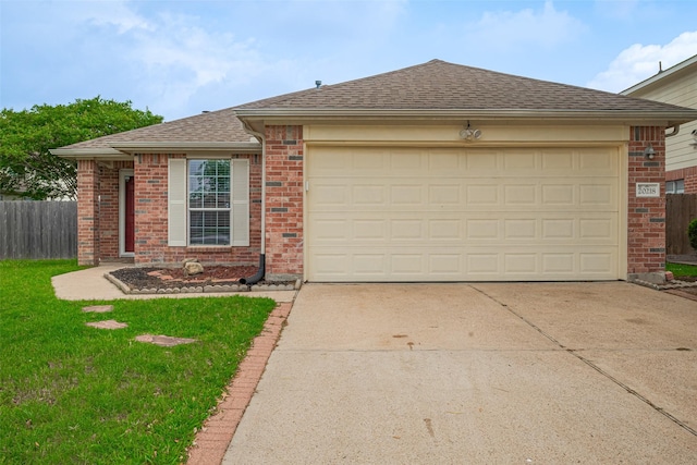 ranch-style house featuring roof with shingles, fence, an attached garage, brick siding, and concrete driveway