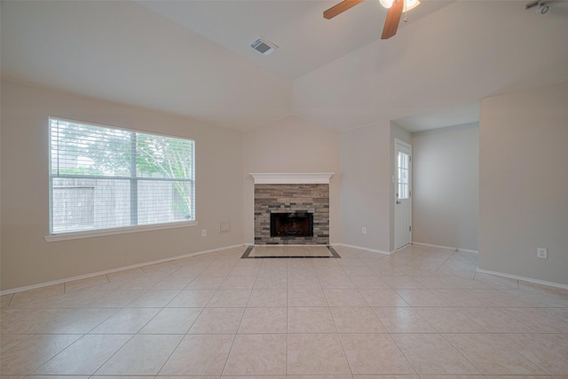 unfurnished living room with ceiling fan, visible vents, light tile patterned floors, and lofted ceiling