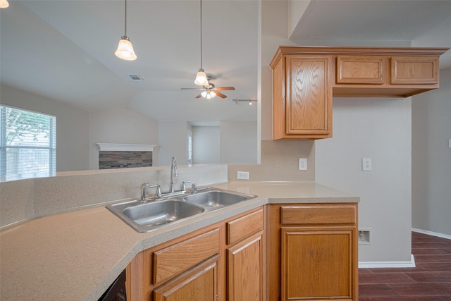 kitchen featuring visible vents, ceiling fan, dark wood-style floors, light countertops, and a sink