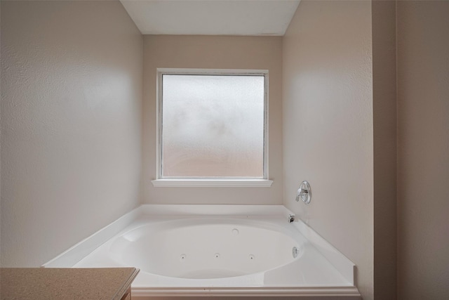 full bath with a jetted tub