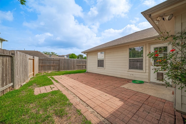 view of patio with a fenced backyard
