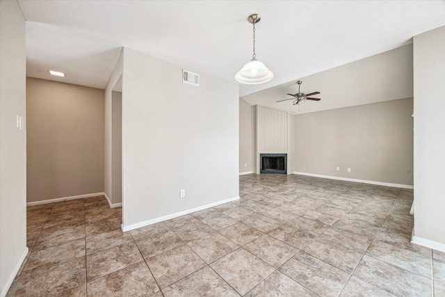 10311 Richmond Hill Dr, Houston, TX 77041 - unfurnished living room with a ceiling fan, a large fireplace, baseboards, and tile patterned flooring
