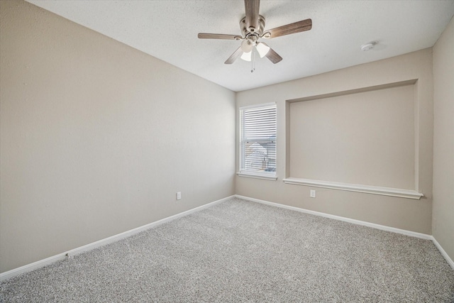 10311 Richmond Hill Dr, Houston, TX 77041 - carpeted spare room with ceiling fan, baseboards, and a smoke detector