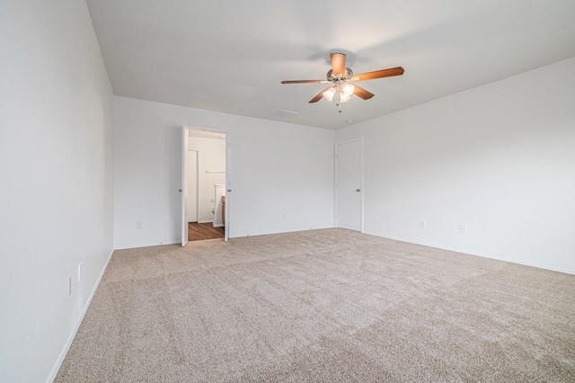 9607 Western Briar Ln, Humble, TX 77396 - carpeted spare room featuring a ceiling fan and baseboards