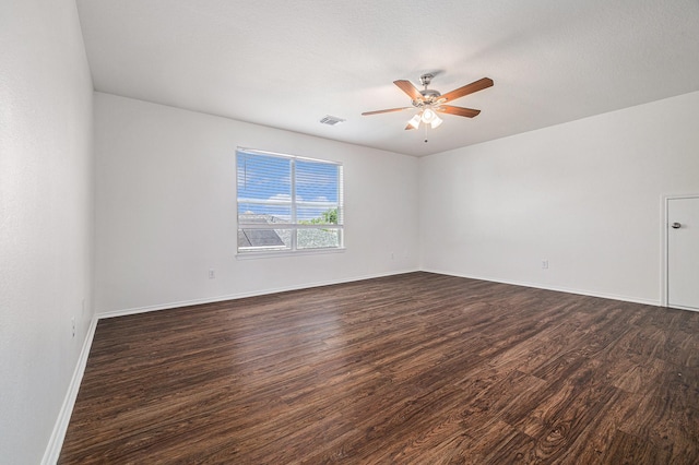 9607 Western Briar Ln, Humble, TX 77396 - spare room with dark wood finished floors and ceiling fan