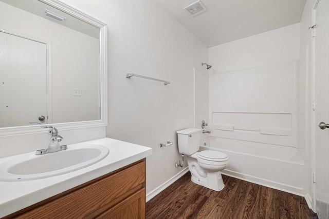 9607 Western Briar Ln, Humble, TX 77396 - bathroom with vanity, wood finished floors, and shower / bathtub combination