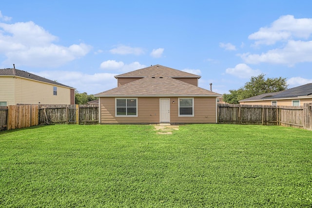 9607 Western Briar Ln, Humble, TX 77396 - back of property with a shingled roof and a fenced backyard