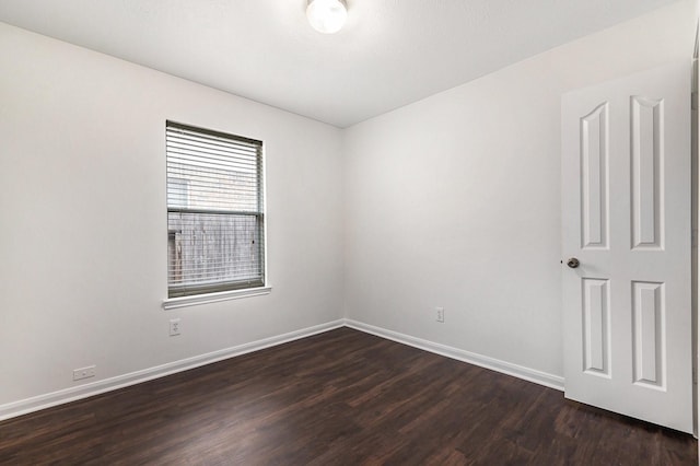 900 Summer Wood Blvd, Conroe, TX 77303 - unfurnished room with dark wood finished floors and baseboards