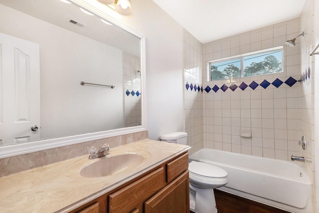 900 Summer Wood Blvd, Conroe, TX 77303 - bathroom with washtub / shower combination, toilet, and vanity