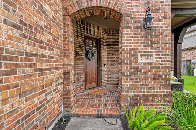 20687 Lavone Dr, Porter, TX 77365 - doorway to property with brick siding