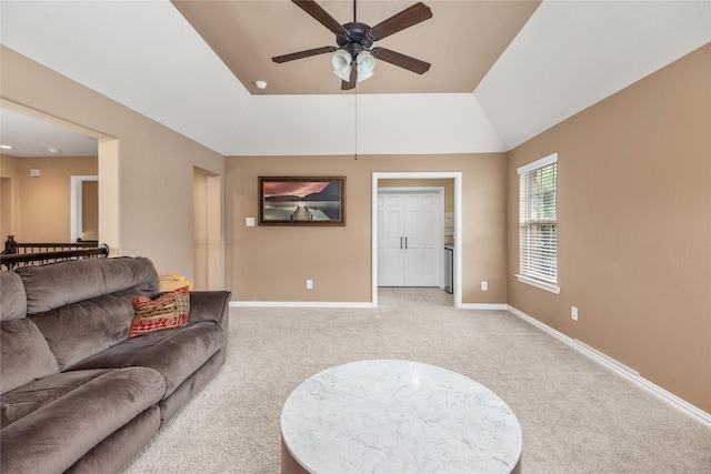 20687 Lavone Dr, Porter, TX 77365 - living room featuring light colored carpet, ceiling fan, baseboards, and vaulted ceiling