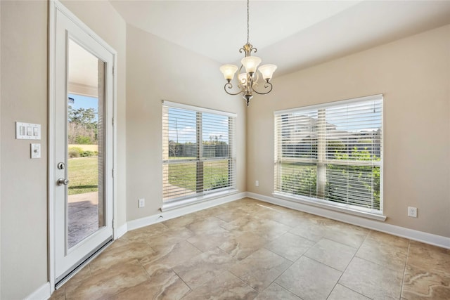 25034 Jennifer Heights Ct, Spring, TX 77389 - unfurnished dining area featuring an inviting chandelier, baseboards, and a healthy amount of sunlight