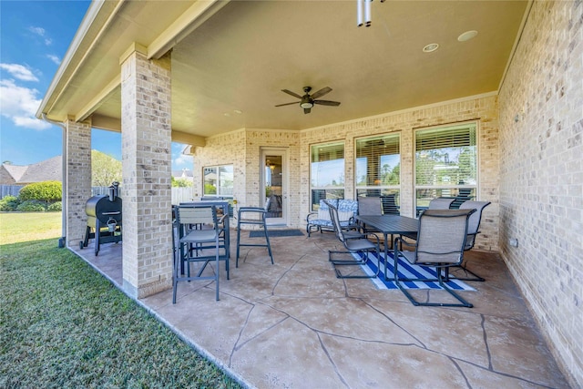 25034 Jennifer Heights Ct, Spring, TX 77389 - view of patio / terrace featuring ceiling fan, a grill, and outdoor dining space