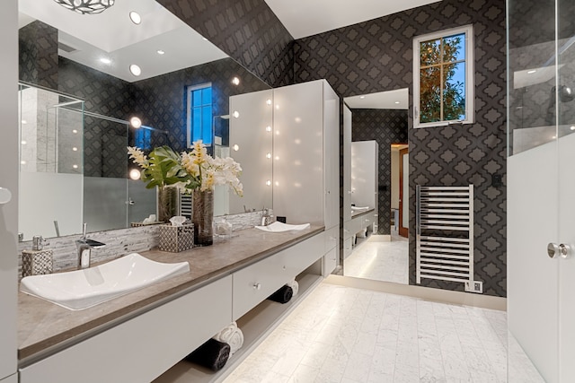 15618 Oyster Cove Dr, Sugar Land, TX 77478 - bathroom featuring beverage cooler, double vanity, wallpapered walls, a tile shower, and recessed lighting