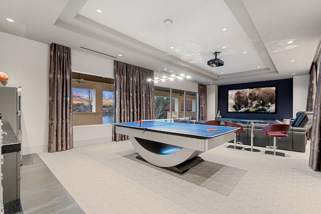 15618 Oyster Cove Dr, Sugar Land, TX 77478 - recreation room featuring a tray ceiling, recessed lighting, and tile patterned flooring