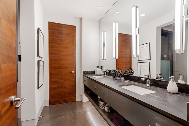 15618 Oyster Cove Dr, Sugar Land, TX 77478 - full bathroom featuring double vanity, tile patterned floors, and recessed lighting