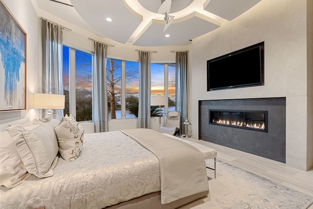 15618 Oyster Cove Dr, Sugar Land, TX 77478 - bedroom with a glass covered fireplace and recessed lighting