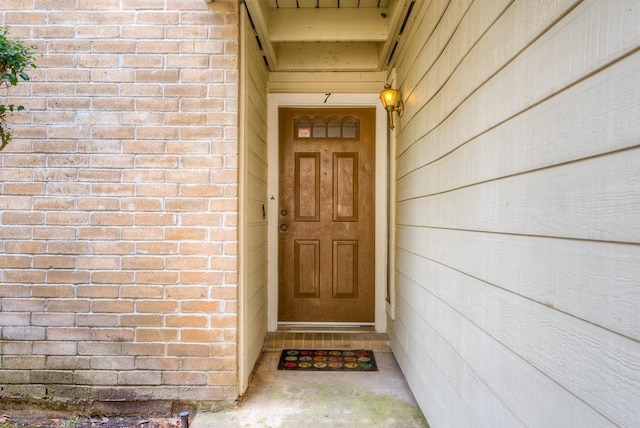 3500 Tangle Brush Dr Unit 7, The Woodlands, TX 77381 - doorway to property with brick siding