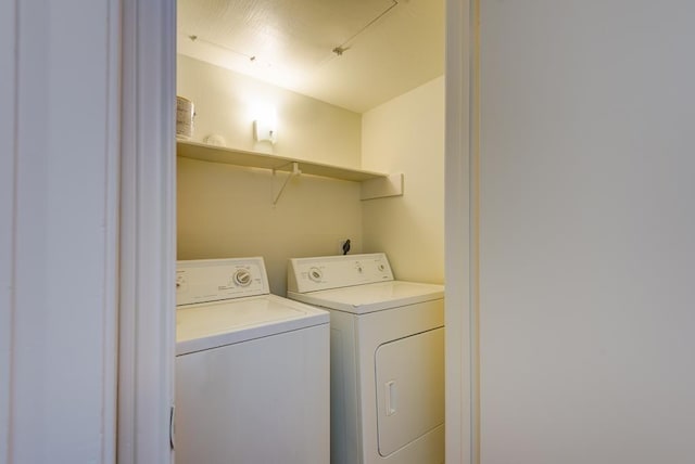 3500 Tangle Brush Dr Unit 7, The Woodlands, TX 77381 - washroom featuring laundry area and washer and clothes dryer