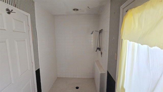 full bathroom featuring a shower stall