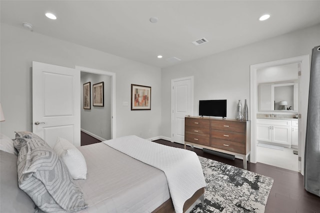 258 Green Blvd, Shenandoah, TX 77384 - bedroom featuring visible vents, recessed lighting, a sink, and dark wood-type flooring