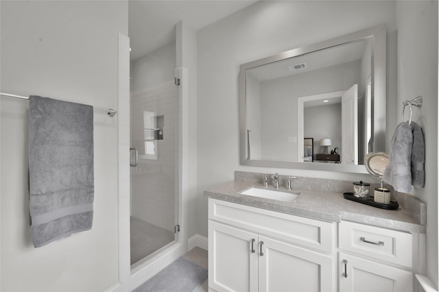 258 Green Blvd, Shenandoah, TX 77384 - bathroom featuring vanity, a stall shower, and visible vents