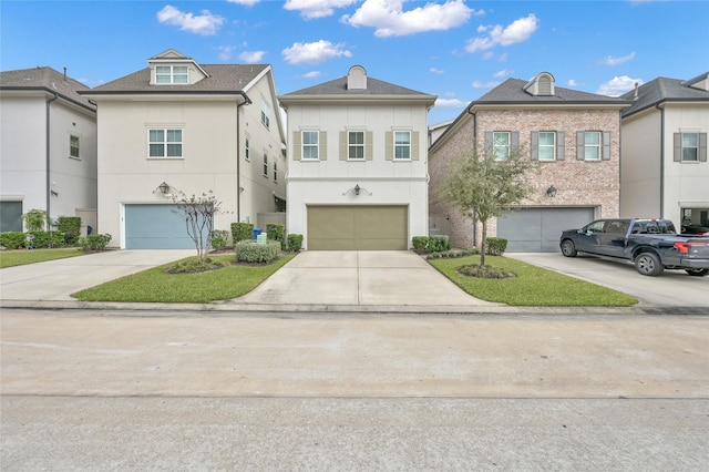 258 Green Blvd, Shenandoah, TX 77384 - townhome / multi-family property with an attached garage, stucco siding, and driveway