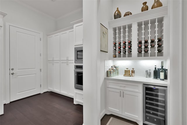 258 Green Blvd, Shenandoah, TX 77384 - bar with crown molding, decorative backsplash, dark wood-style flooring, beverage cooler, and appliances with stainless steel finishes