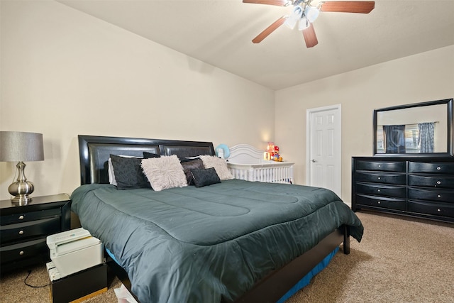 carpeted bedroom featuring a ceiling fan