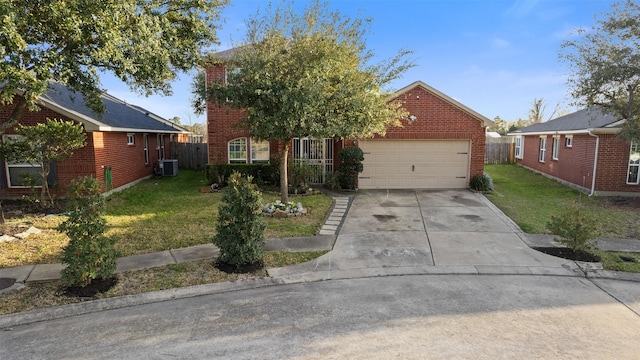 view of property hidden behind natural elements featuring a front lawn, fence, brick siding, an attached garage, and driveway